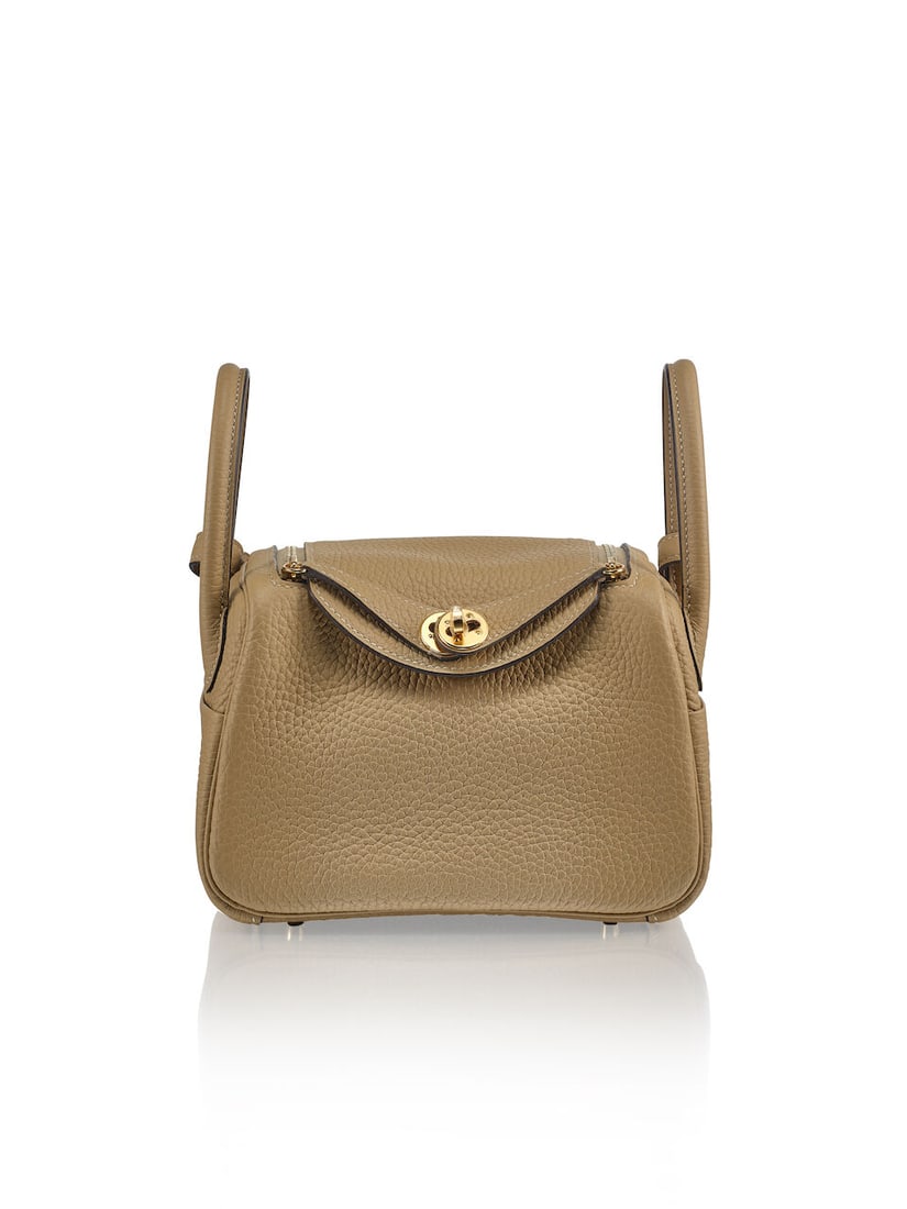 HERMÈS: TRENCH CLEMENCE MINI LINDY 20 WITH GOLD HARDWARE 2024 (Includes dust bag and box): HERMÈS: TRENCH CLEMENCE MINI LINDY 20 WITH GOLD HARDWARE 2024 愛馬仕：風衣灰CLEMENCE牛皮迷你LINDY 20厘米配Ɩ