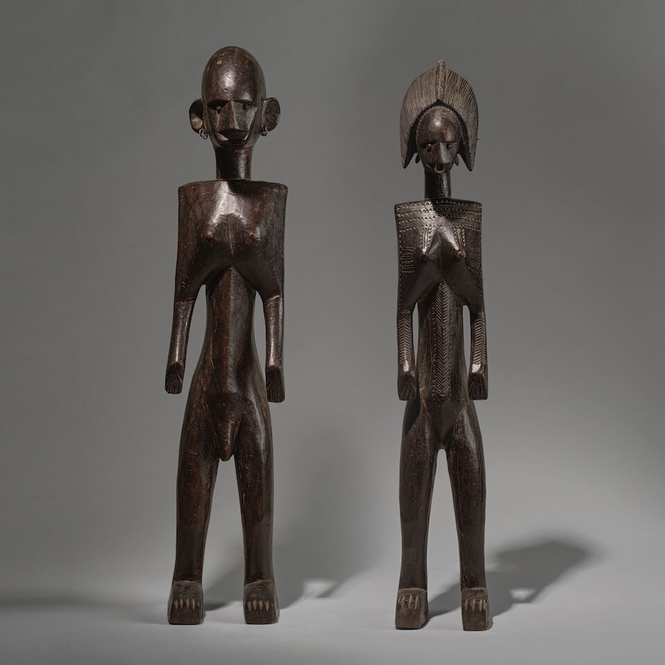 COUPLE DE STATUES BAMANA, MALI: COUPLE DE STATUES BAMANA, MALI bois, métal Hauteur: 71.5 et 70 cm. PAIR OF BAMANA FIGURES Mali Provenance Collection privée, France For further information on this lot please visit Bonhams.c