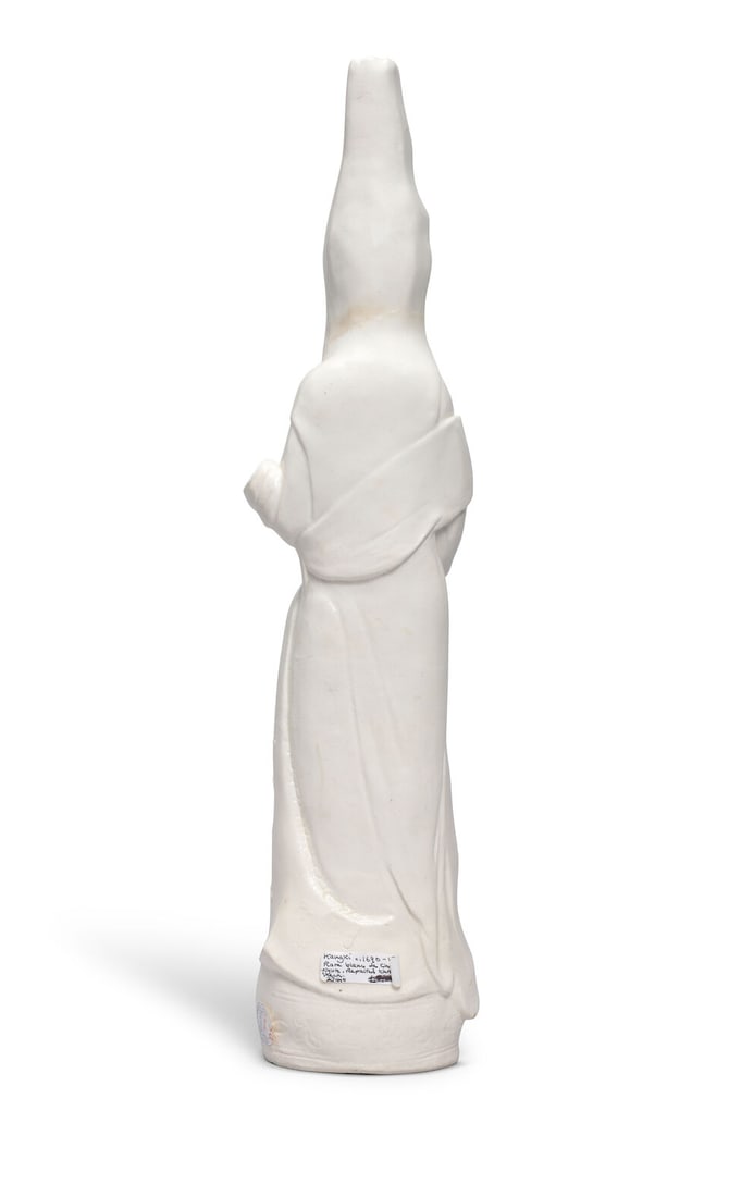 A BLANC-DE-CHINE FIGURE OF A PROVOCATIVE LADY 17th/18th century - 2