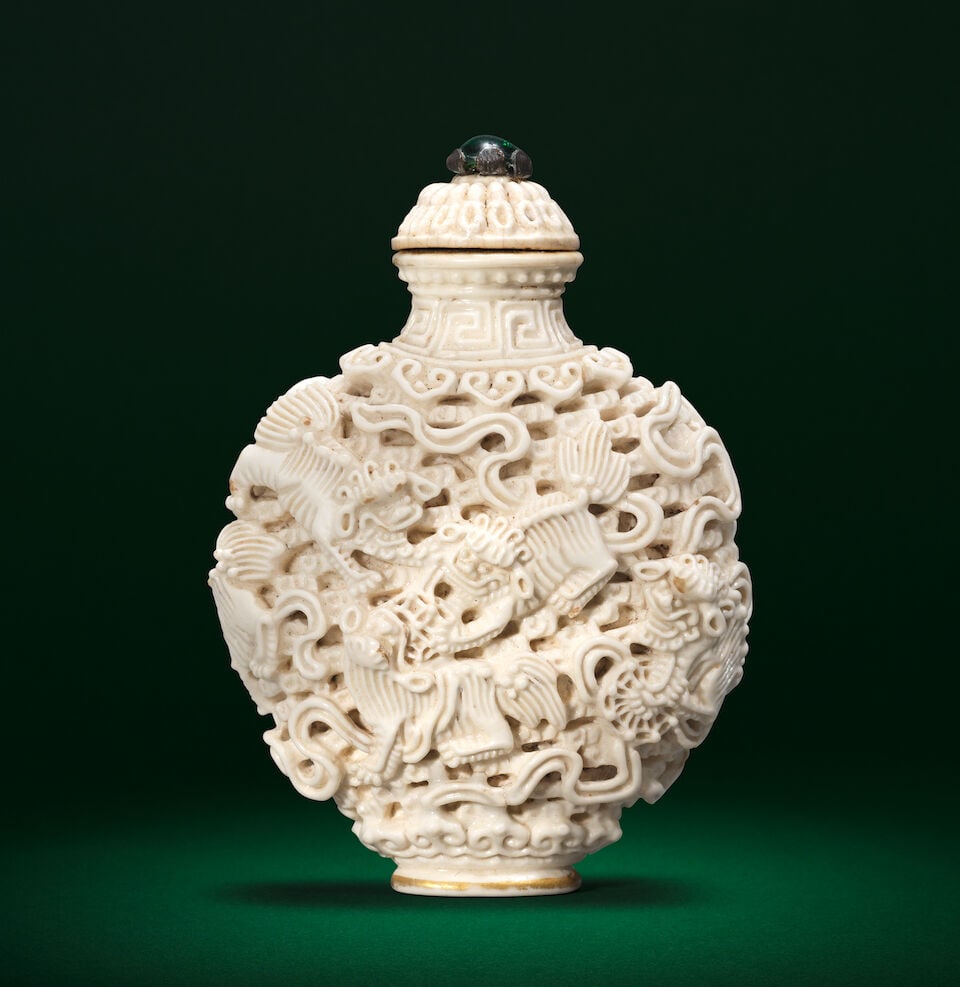 A WHITE-GLAZED RETICULATED 'BUDDHIST LIONS' SNUFF BOTTLE AND STOPPER Jiaqing seal mark and of th... - 3