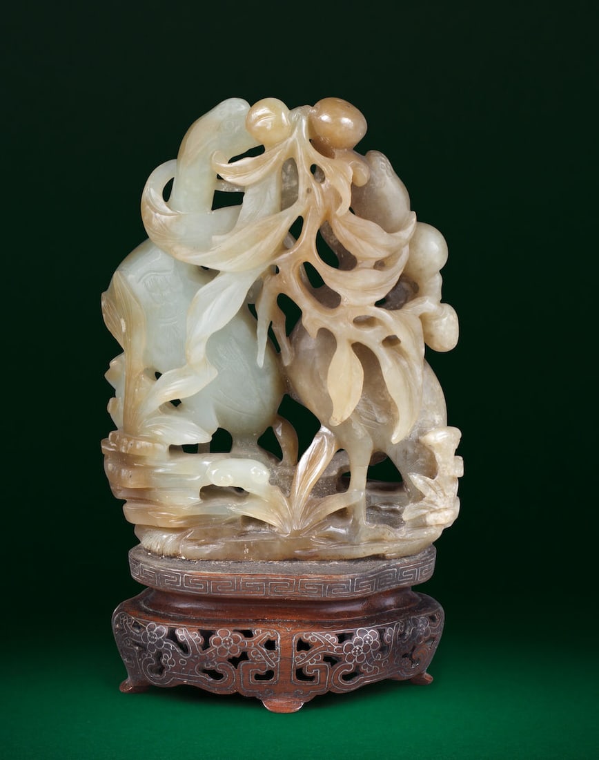 A PALE GREEN AND CHESTNUT-BROWN JADE 'DOUBLE CRANE AND PEACHES' CARVING 18th/19th century - 2