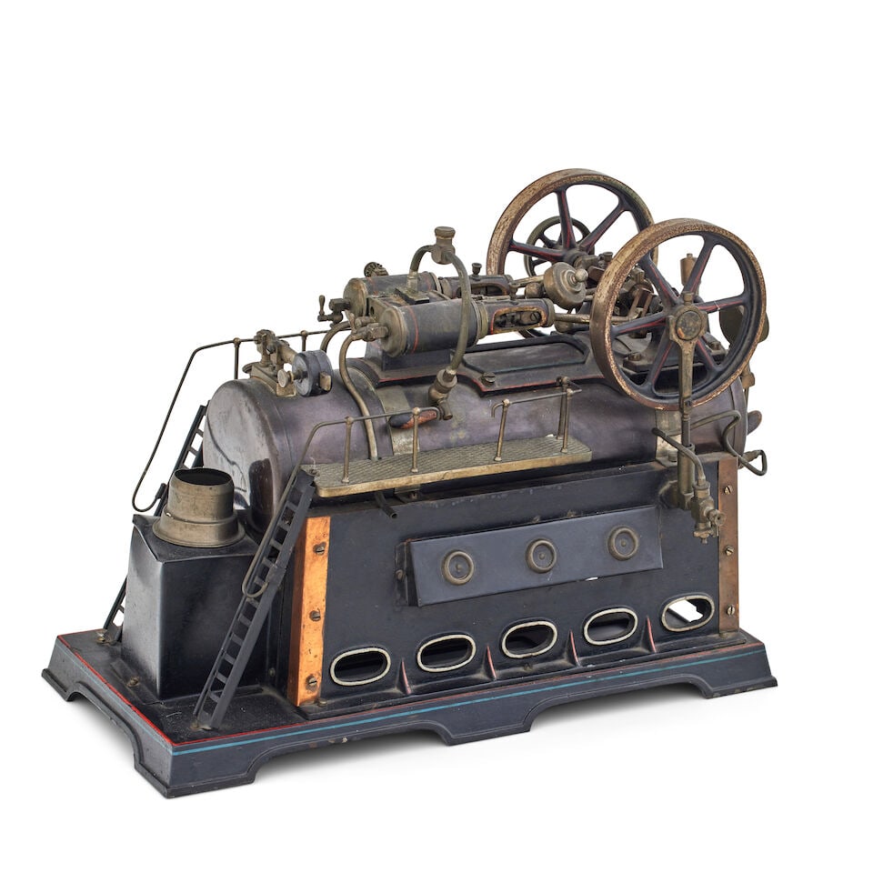 A twin cylinder steam engine by Doll & Co, German, 1920s, Probably model 512/1: A twin cylinder steam engine by Doll & Co, German, 1920s, Probably model 512/1 Horizontal twin, painted green with red and blue striping, nickel plated guard rail, 4-inch diameter boiler, 18.5cm wide,