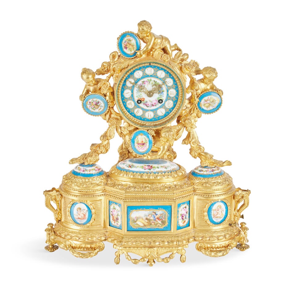 A 19th century ormolu Sevres style porcelain mounted mantel clock with musical movement The m... (1 of 1)