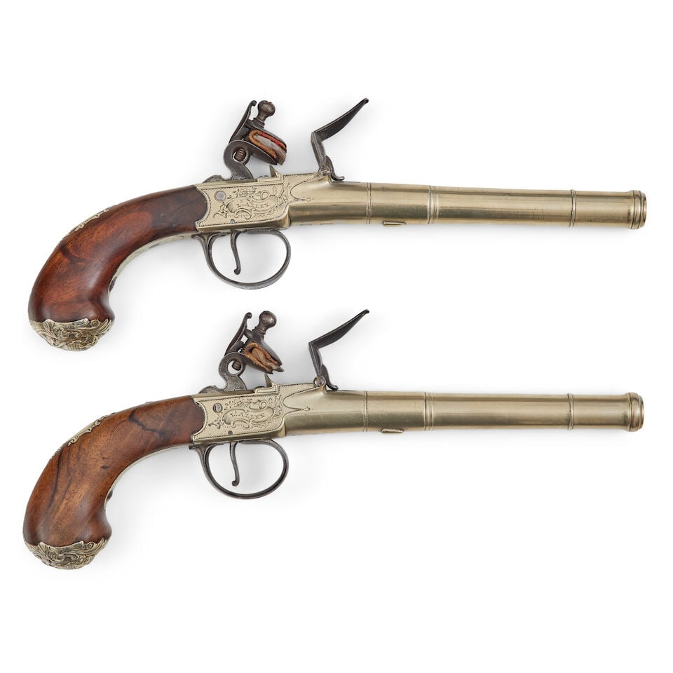 A pair of 28-bore brass turn off boxlock flintlock pistols by L. Alley of Dublin (1 of 2)