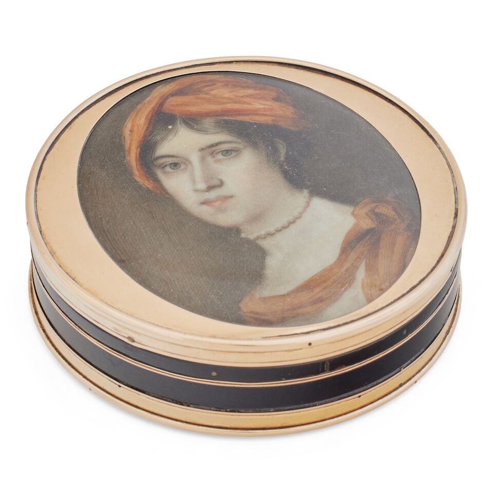 A gold-mounted tortoiseshell portrait miniature snuff box Probably Swiss, 19th century, the moun...: A gold-mounted tortoiseshell portrait miniature snuff box Probably Swiss, 19th century, the mounts struck with two indistinct control marks The shallow box with lid inset with a glazed oval portrait