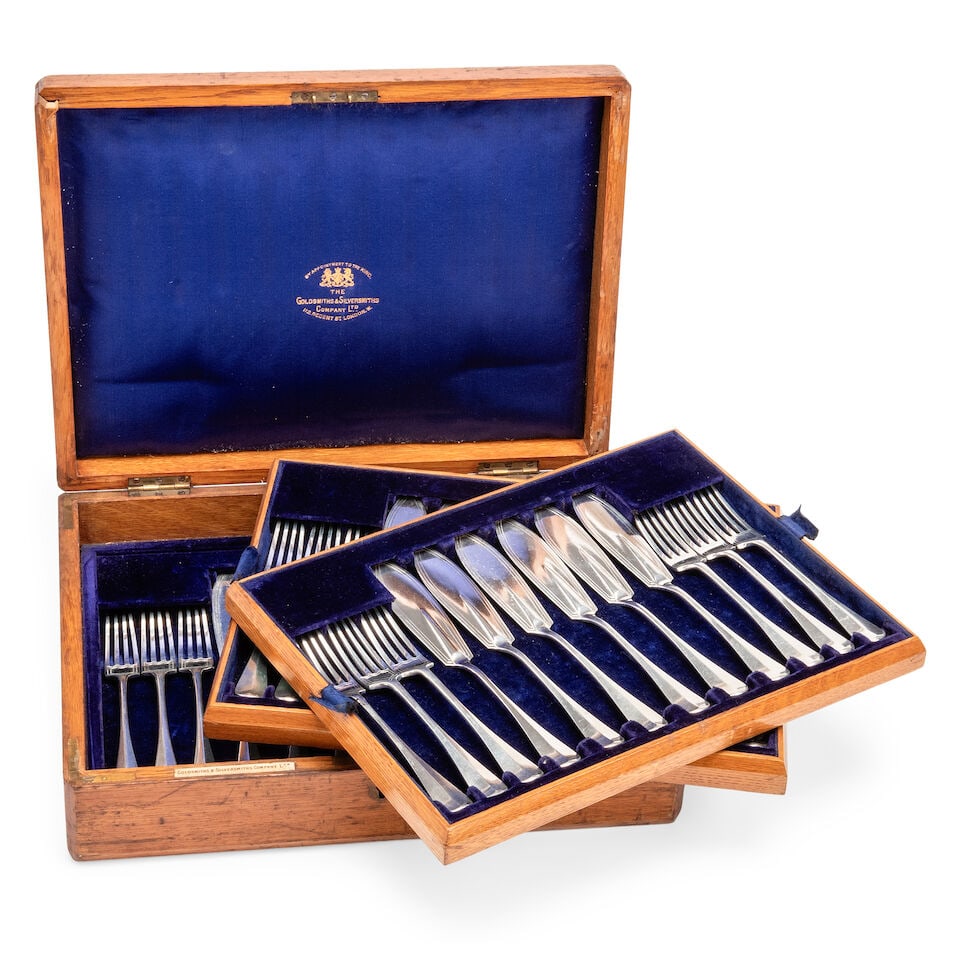 An Edwardian canteen of Hanoverian pattern fish cutlery By Goldsmiths and Silversmiths company, ... (1 of 2)