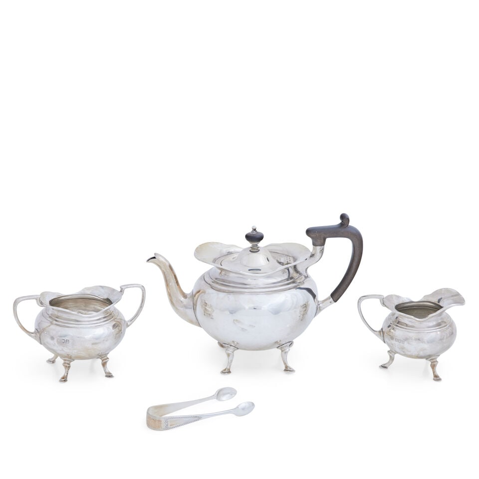 An Edwardian silver three piece bachelors tea service By Carrington & Co., London, 1909 (4) (1 of 1)