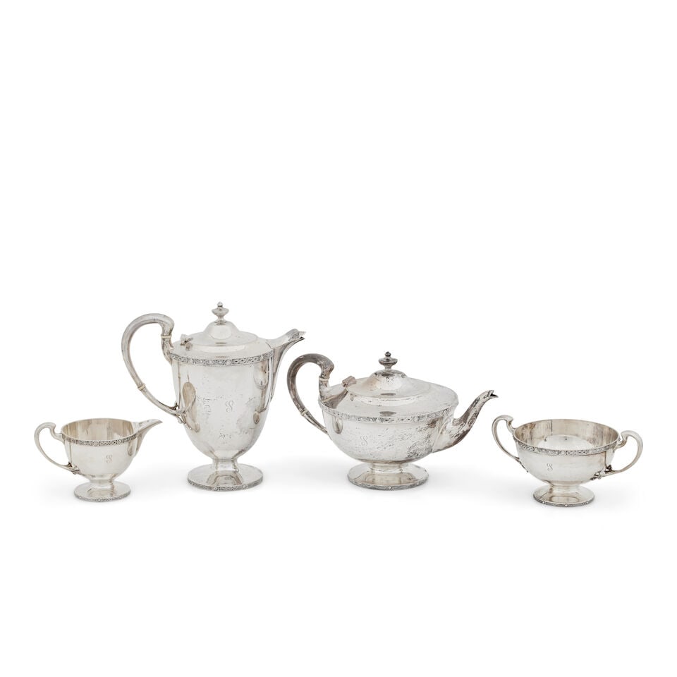A four piece Celtic revival tea service By Hamilton and Inches, Edinburgh, 1926, the hot water p... (1 of 1)