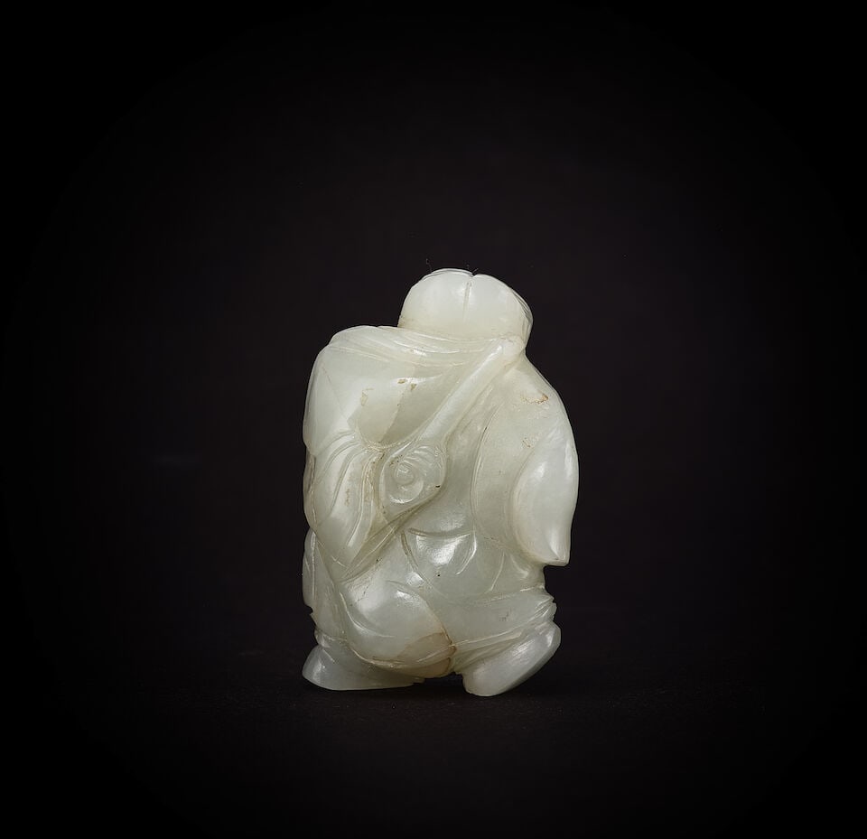 A PALE GREEN JADE FIGURE Qing Dynasty, 18th century (3) - 2