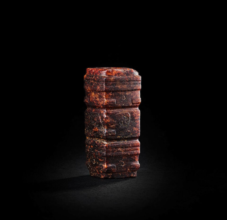 A SMALL JADE CONG Neolithic Period: A SMALL JADE CONG Neolithic Period Fitted box. 5.6cm high Footnotes: 新石器時代　小玉琮 For further information on this lot please visit