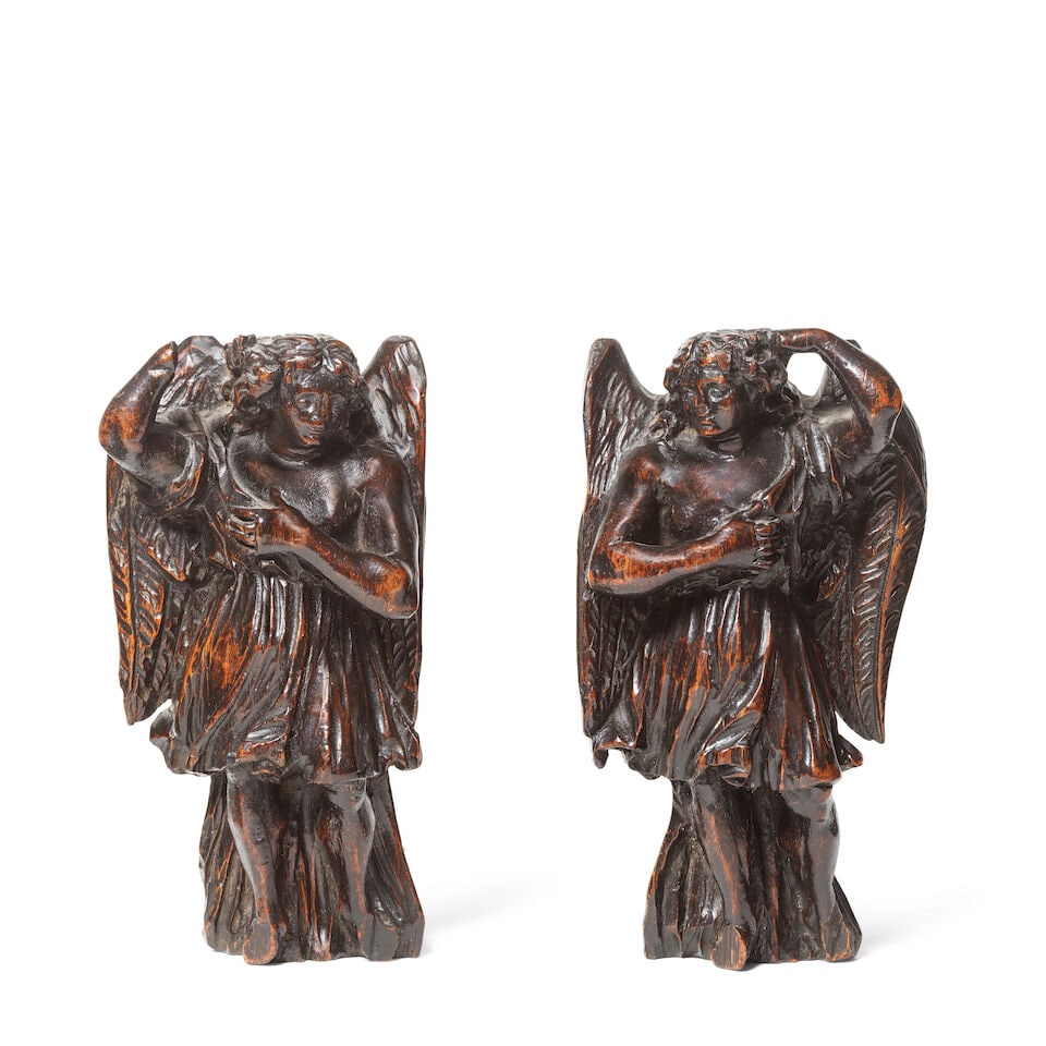 A pair of carved walnut figures of angels 18th century (2) (1 of 2)