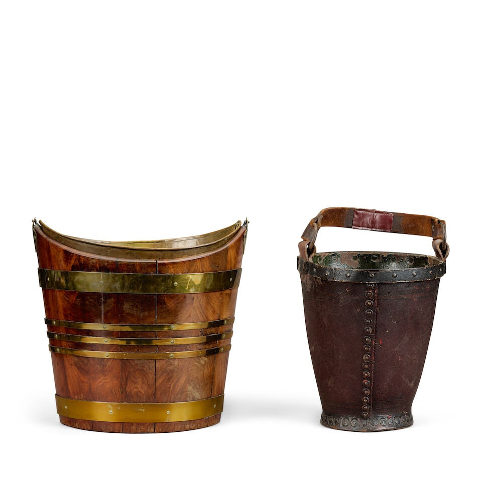 A George III mahogany and brass bound bucket, together with a Victorian painted leather country ... (1 of 2)