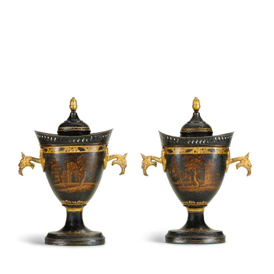A pair of Regency black and gilt decorated toleware chestnut urns and covers Early 19th century ... (1 of 2)
