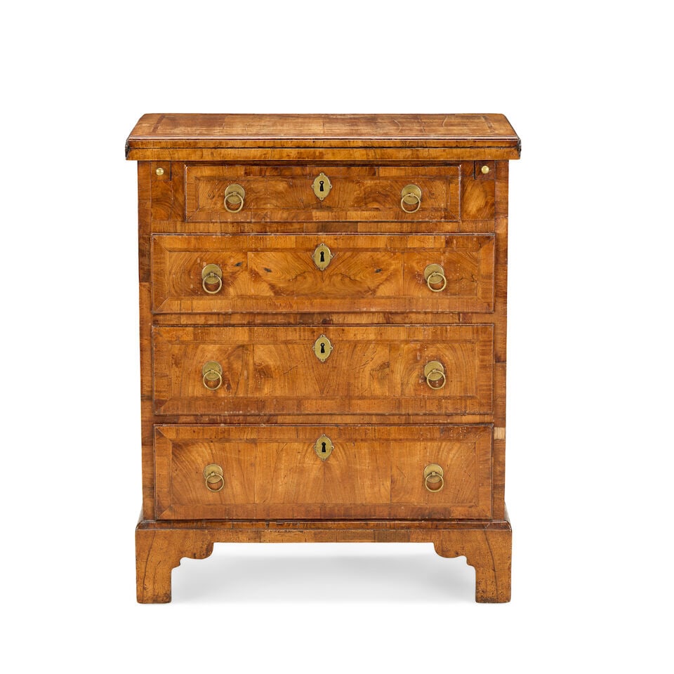 A George II walnut, crossbanded and featherbanded bachelor's chestSecond quarter 18th century (1 of 6)