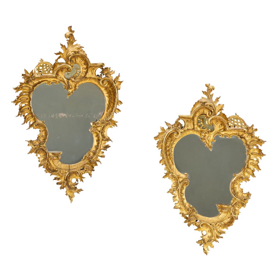 A pair of carved giltwood mirrors in the Rococo style Italian, late 19th century (2) (1 of 5)