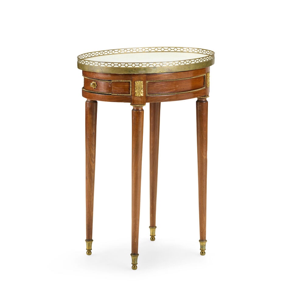 A late Louis XVI mahogany, gilt bronze and brass mounted gueridon Late 18th / early 19th century... (1 of 3)