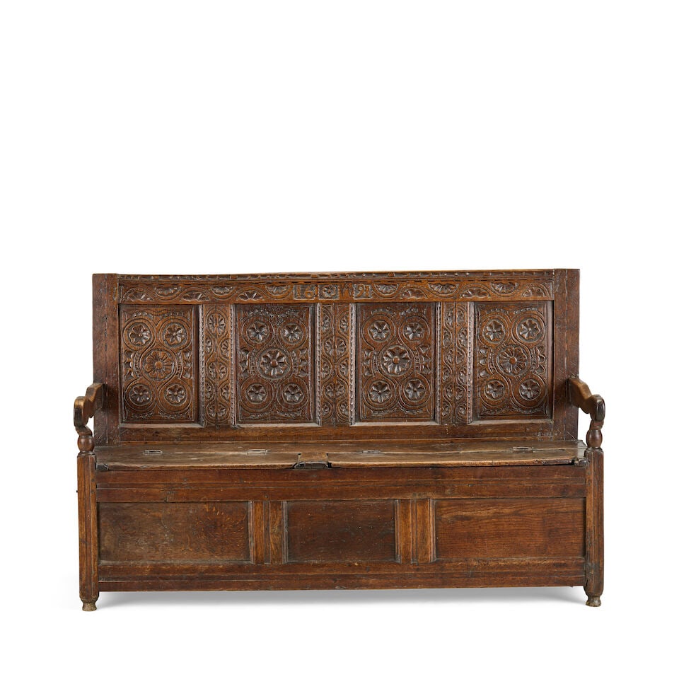 An 18th century and later carved oak and elm box settle (1 of 3)