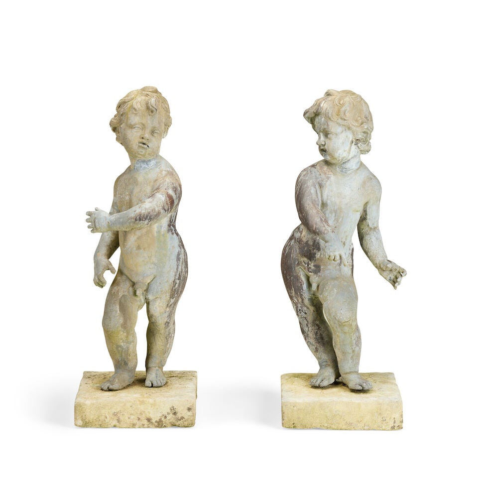 Two cast lead garden figures of putti20th century (2) (1 of 2)