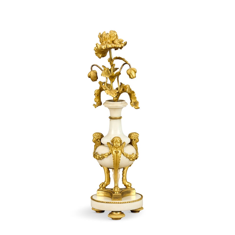 A late Louis XVI gilt bronze, gilt metal and marble candlestick Late 18th / early 19th century (1 of 2)