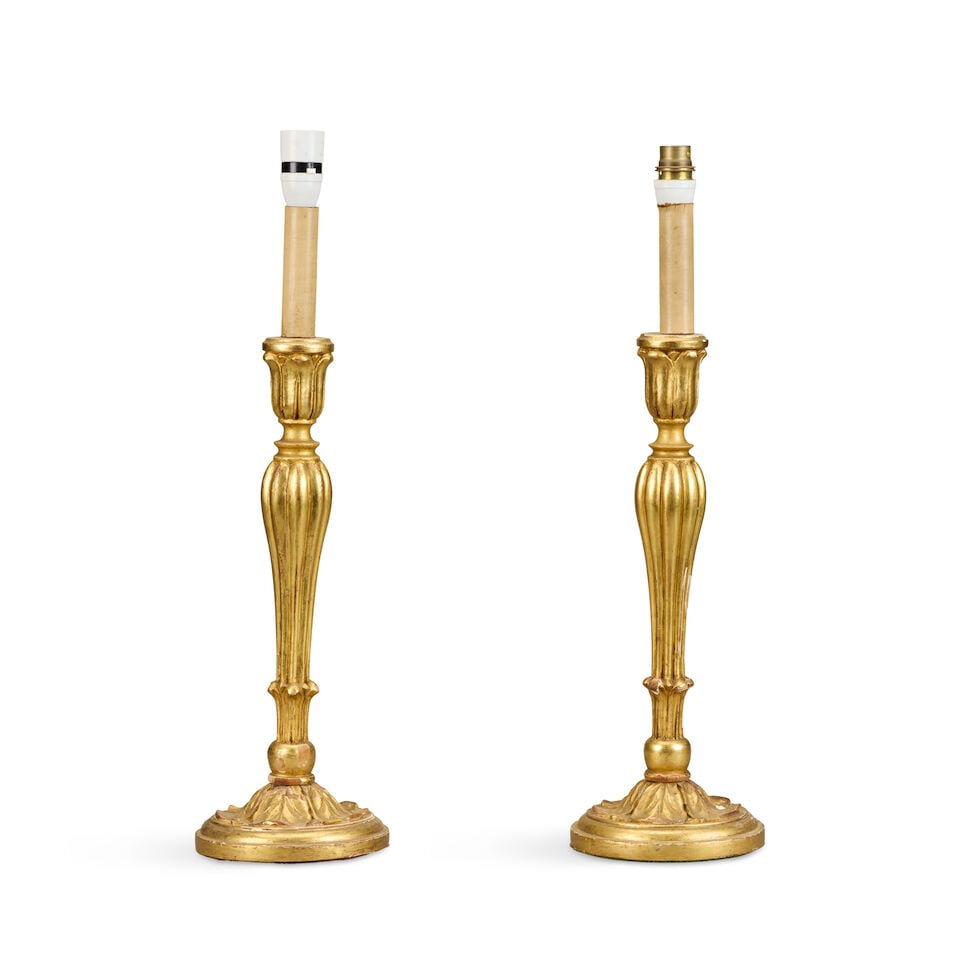 A pair of carved and turned giltwood candlesticks adapted to lampbases 20th century (2) (1 of 2)