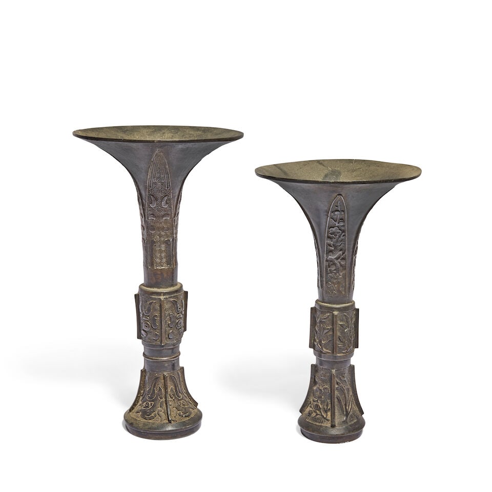Two Chinese bronze vases, Gu Qing Dynasty (2): Two Chinese bronze vases, Gu Qing Dynasty Each of slender form, the larger: 24.25cm (9 1/2in) high (2). For further information on this lot please visit Bonhams.com For further information about this 