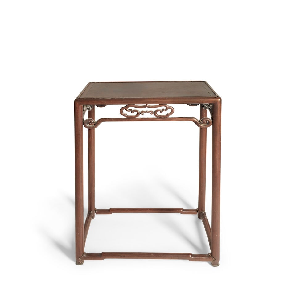 A Chinese hardwood stand 19th/20th century: A Chinese hardwood stand 19th/20th century The rectangular top above a pierced gallery, 47cm wide x 28cm deep x 75cm high, (18.5in wide x 11in deep x 29.5in high) This lot is subject to the following