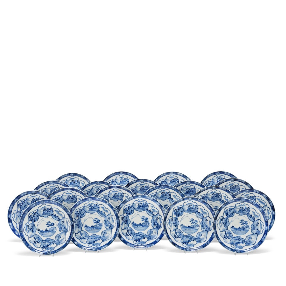 A set of twenty blue and white Japanese dinner plates 19th century (20): A set of twenty blue and white Japanese dinner plates 19th century Decorated with landscape scenes, 23.5cm (9in) diameter (20). For further information on this lot please visit Bonhams.com For further