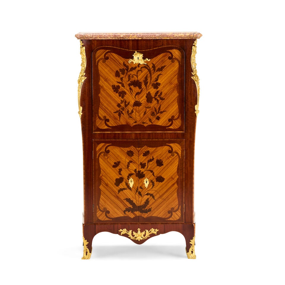 A French tulipwood, purplewood, floral marquetry and gilt bronze mounted secretaire à abatt...: A French tulipwood, purplewood, floral marquetry and gilt bronze mounted secretaire à abattant Late 19th century in the Louis XV style and in the manner of Leonard Boudin, and bearing the stamp f
