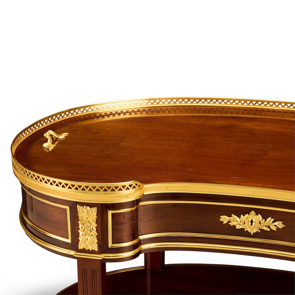 A French mahogany and gilt bronze mounted kidney shaped tableIn the Transitional style - 4