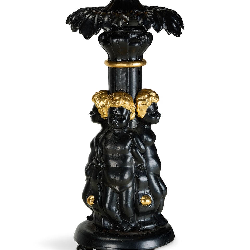 A large pair of painted and parcel gilt cast iron five branch candelabra20th century in the mid-... - 2