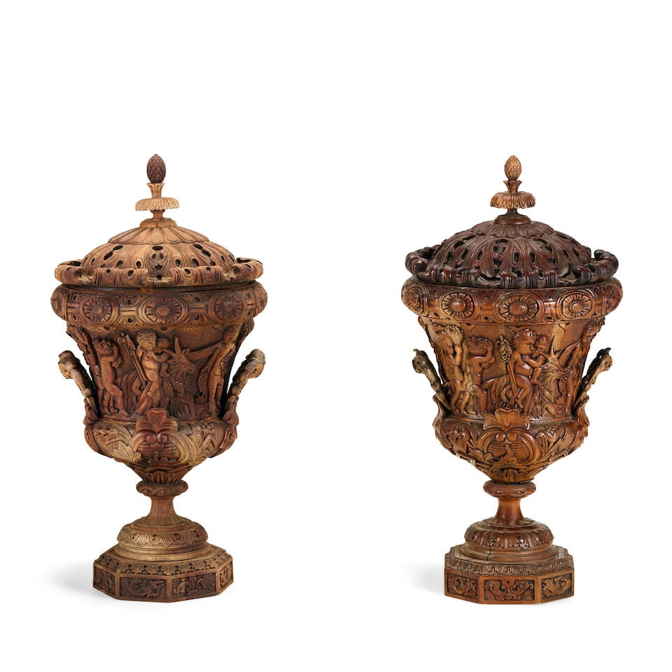 A pair of carved walnut urns and covers Italian in the Baroque style (2) (1 of 4)