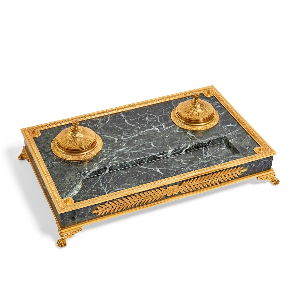 A large French green marble and gilt bronze mounted desk stand In the Louis XVI style (6): A large French green marble and gilt bronze mounted desk stand In the Louis XVI style Of rectangular form, the solid marble body fitted with two foliate cast hinged inkwells (lacking glass liners) and