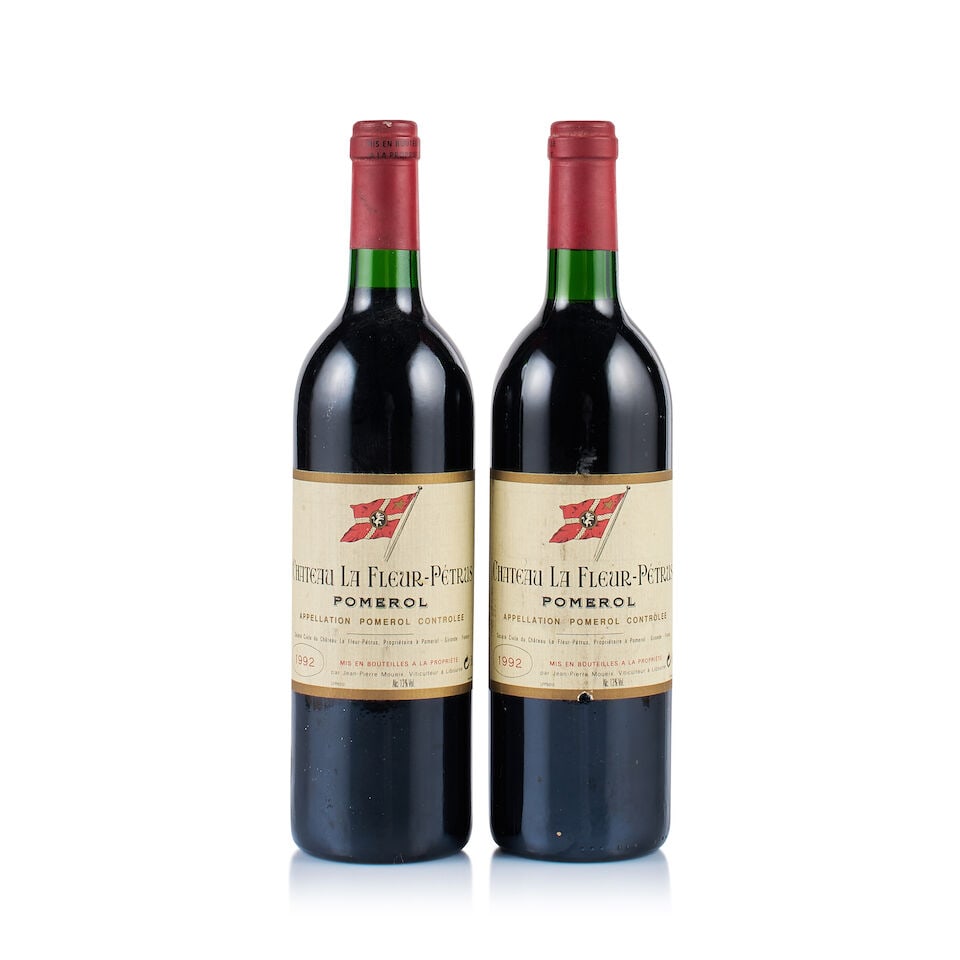 Château La Fleur-Pétrus, Pomerol, 1992 (2 x 750ml): Château La Fleur-Pétrus, Pomerol, 1992 (2 x 750ml) Region: Bordeaux Fill Level: 1x base of neck, 1x into neck Capsule: 2x corroded Cork: ok Label: all bin-soiled, stained and 1x scratched at