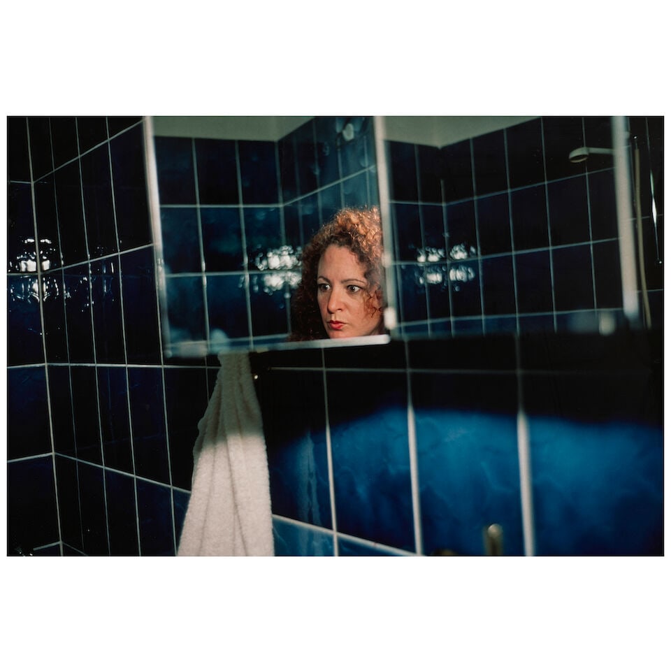 Nan Goldin (born 1953); 'Self portrait in my blue bathroom, Berlin'; (1 of 3)