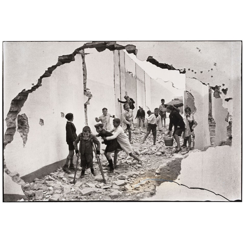 Henri Cartier-Bresson (1908-2004); Seville;: Henri Cartier-Bresson (1908-2004) Seville, 1933 Gelatin silver print, printed before 1989; signed in ink and the photographer's blindstamp in the margin. 11 7/8 x 17 5/8 in. (30.2 x 44.8 cm.) sheet 15