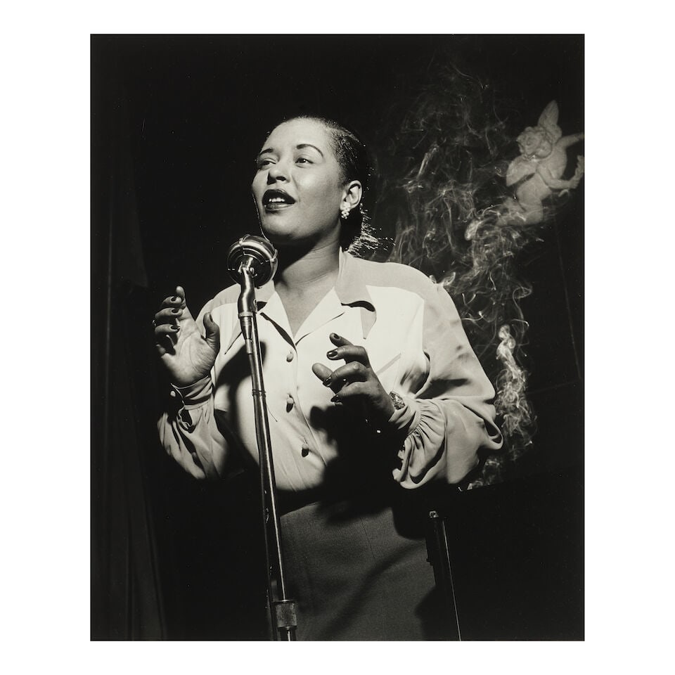 Herman Leonard (1923-2010); 'Billie Holiday, NYC';: Herman Leonard (1923-2010) 'Billie Holiday, NYC', 1949 Gelatin silver print, printed later; signed, titled, and dated in ink in the margin, framed. 16 7/8 x 13 7/8 in. (42.9 x 35.2 cm.) sheet 19 3/4