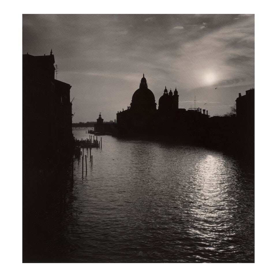 Michael Kenna (born 1953); 'Grand Canal Sunset, Venice, Italy';: Michael Kenna (born 1953) 'Grand Canal Sunset, Venice, Italy', 1987 Sepia-toned gelatin silver print, printed 2007; mounted, signed, dated, and editioned '5/45' in pencil on the mount, the photographe