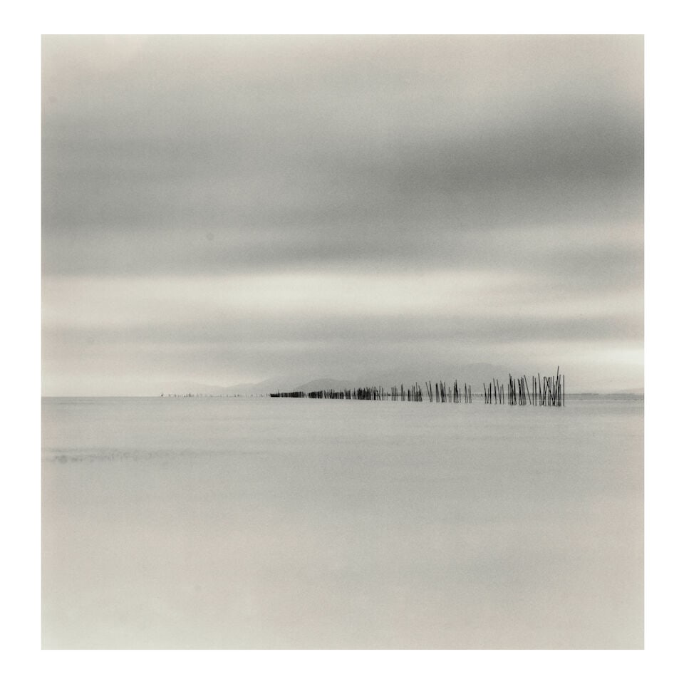 Michael Kenna (born 1953); 'Fishing Posts, Biwa Lake, Honsha, Japan';: Michael Kenna (born 1953) 'Fishing Posts, Biwa Lake, Honsha, Japan', 2001 Sepia-toned gelatin silver print, printed 2002; mounted, signed, dated, and editioned '9/45' in pencil on the mount, the photo
