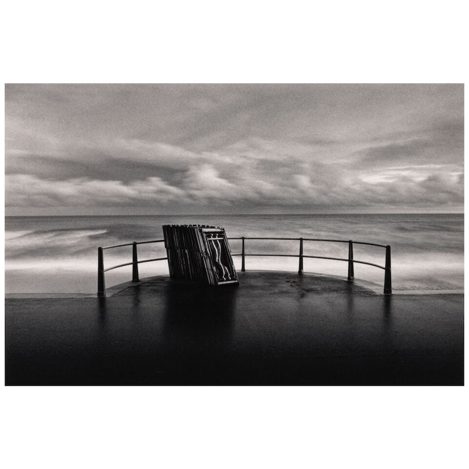Michael Kenna (born 1953); 'Deckchairs, Bournemouth, Dorset, England';: Michael Kenna (born 1953) 'Deckchairs, Bournemouth, Dorset, England', 1983 Sepia and selenium-toned gelatin silver print, printed 1984; mounted, signed, dated, and editioned '25/45' in pencil on the