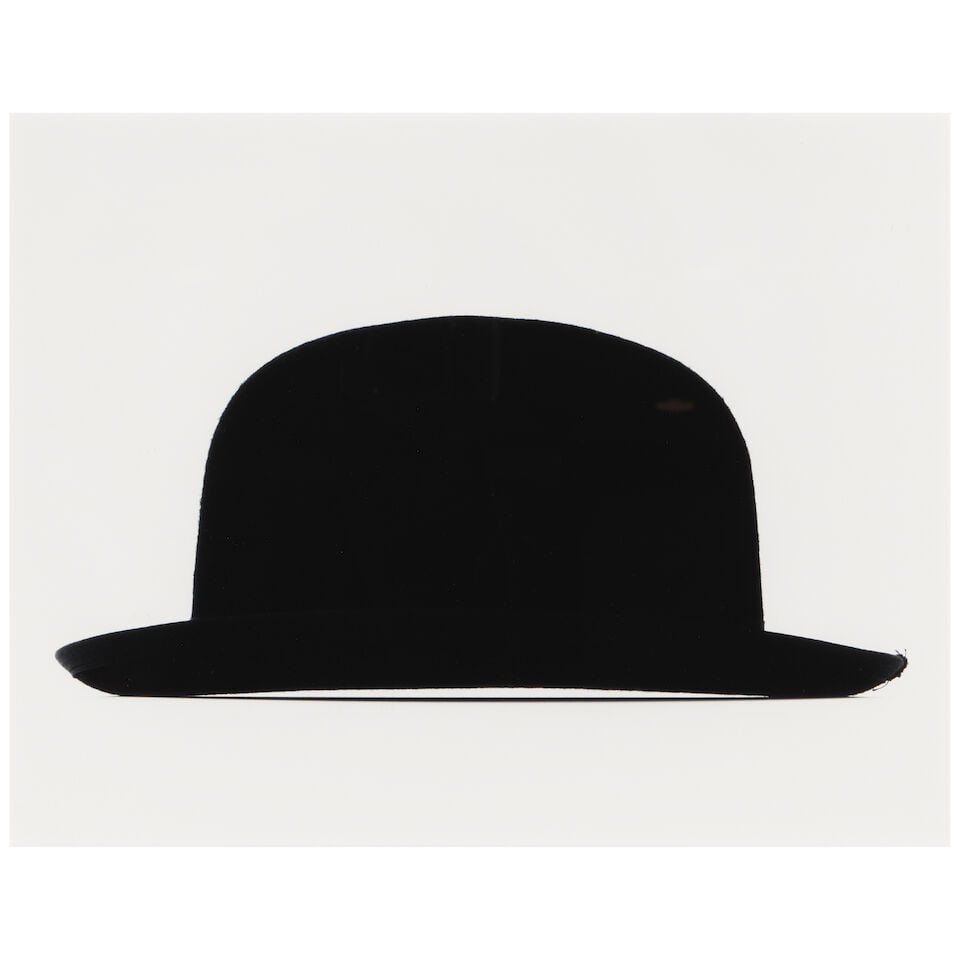 BILL RAUHAUSER (1918-2017); Untitled (Bowler Hat) (from 'Object Series');: BILL RAUHAUSER (1918-2017) Untitled (Bowler Hat) (from 'Object Series'), 1960 Gelatin silver print, printed later; signed in pencil on the reverse, framed. 16 x 19 7/8in Footnotes: From Diane