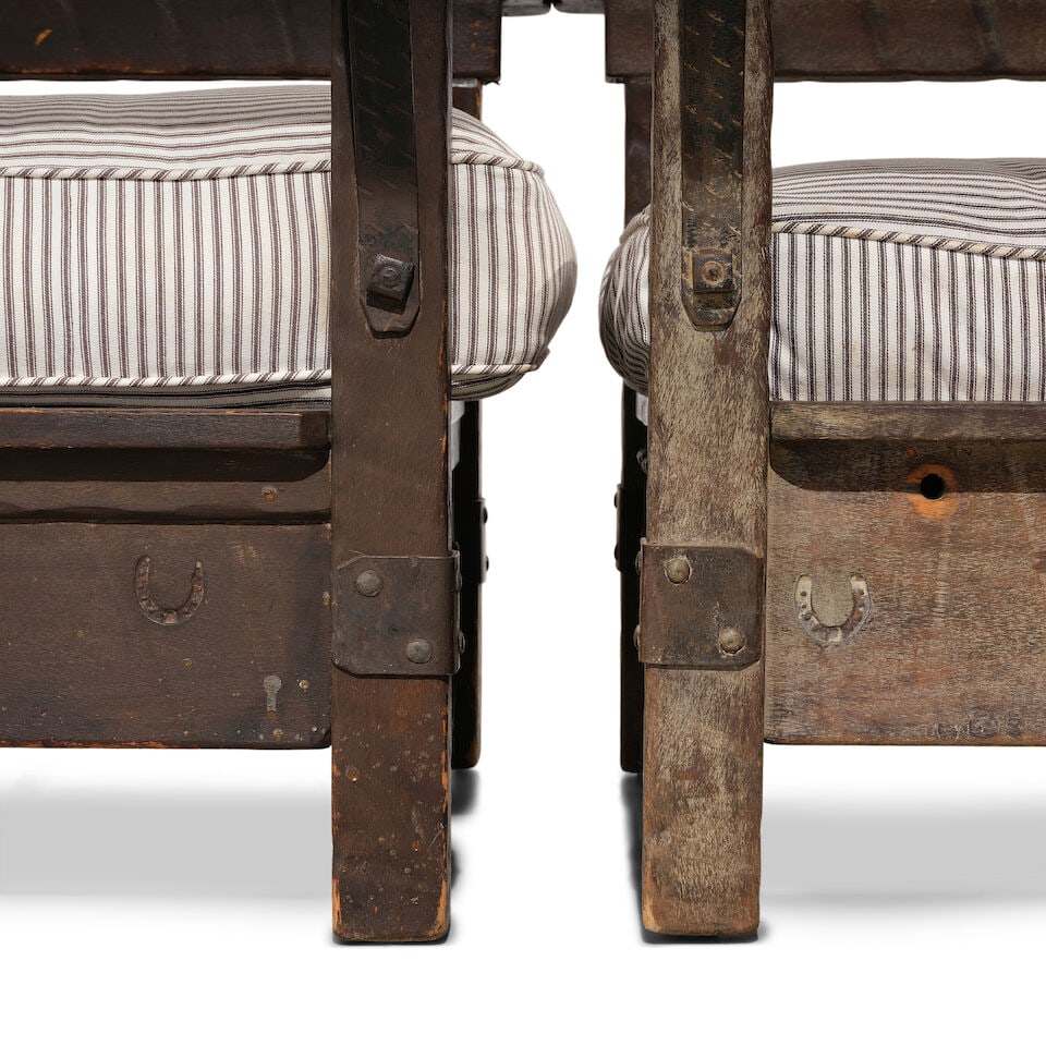 TWO MONTEREY IRON MOUNTED PAINT DECORATED AND OLD WOOD LIGHT STAINED CLUB CHAIRSCirca 1930 - 2