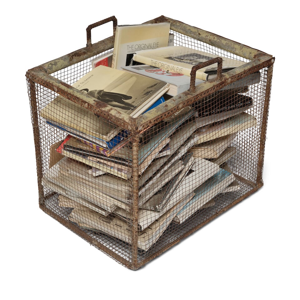 A INDUSTRIAL METAL CRATE FILLED WITH BOOKS (1 of 2)