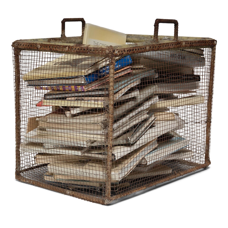 A INDUSTRIAL METAL CRATE FILLED WITH BOOKS - 2