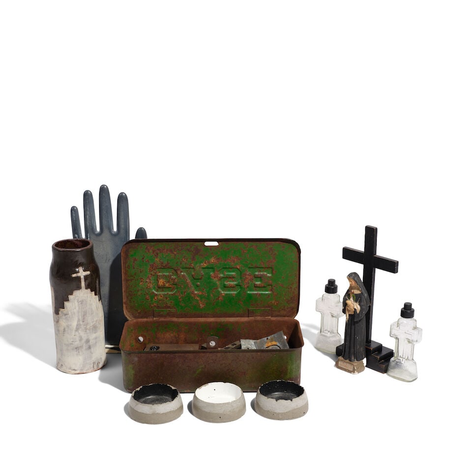 A CURATED GROUP OF CURIOUS TABLE DECORATIONS: A CURATED GROUP OF CURIOUS TABLE DECORATIONS Comprising a composition hand hook, a glazed terracotta vase inscribed to the underside SAN GERONIMO / KERB, a greenwashed tin box inscribed CASE filled