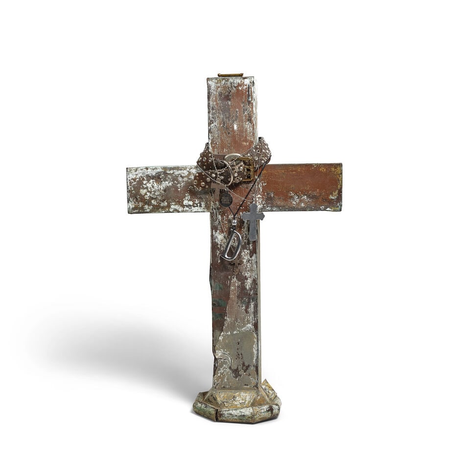 A PAINTED METAL CROSS DECORATED WITH JEWELRY: A PAINTED METAL CROSS DECORATED WITH JEWELRY Including a leather rhinestone studded dog collar, a leather and silvered metal dog collar, a small silvered metal cross on chain, a sterling silver cross
