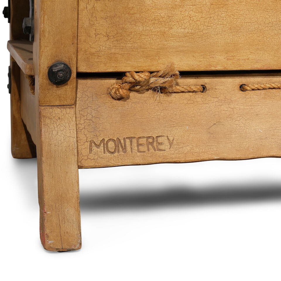 A MONTEREY IRON MOUNTED ROPE AND PAINTED STRAW IVORY STAINED WOOD SETTEECirca 1931 - 2