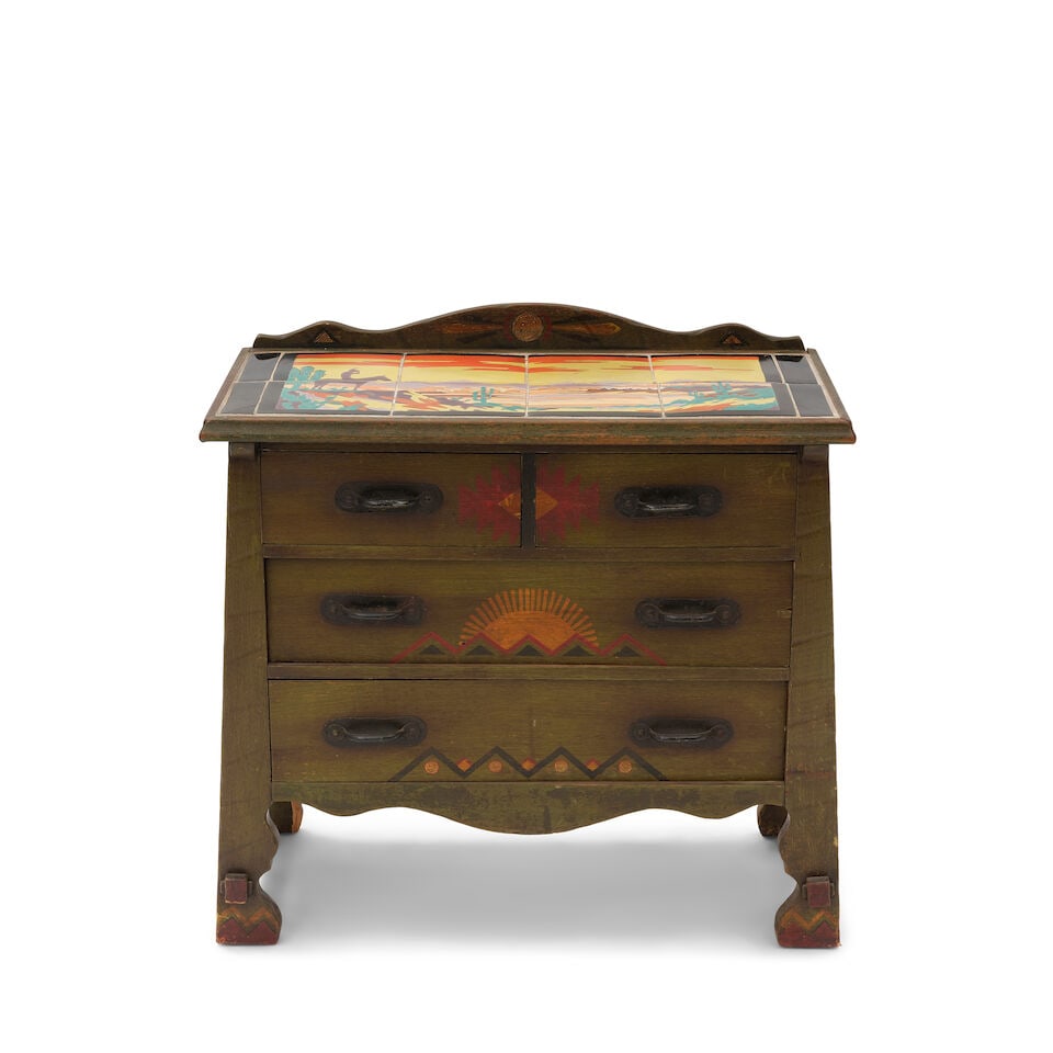 A MONTEREY IRON MOUNTED CATALINA TILE INSET PAINT DECORATED OLD WOOD STAINED LOWBOY DRESSERCirca...: A MONTEREY IRON MOUNTED CATALINA TILE INSET PAINT DECORATED OLD WOOD STAINED LOWBOY DRESSER Circa 1933 With branded horseshoe insignia. height 38 1/2in; width 39in; depth 19 3/4in This lot is subject 