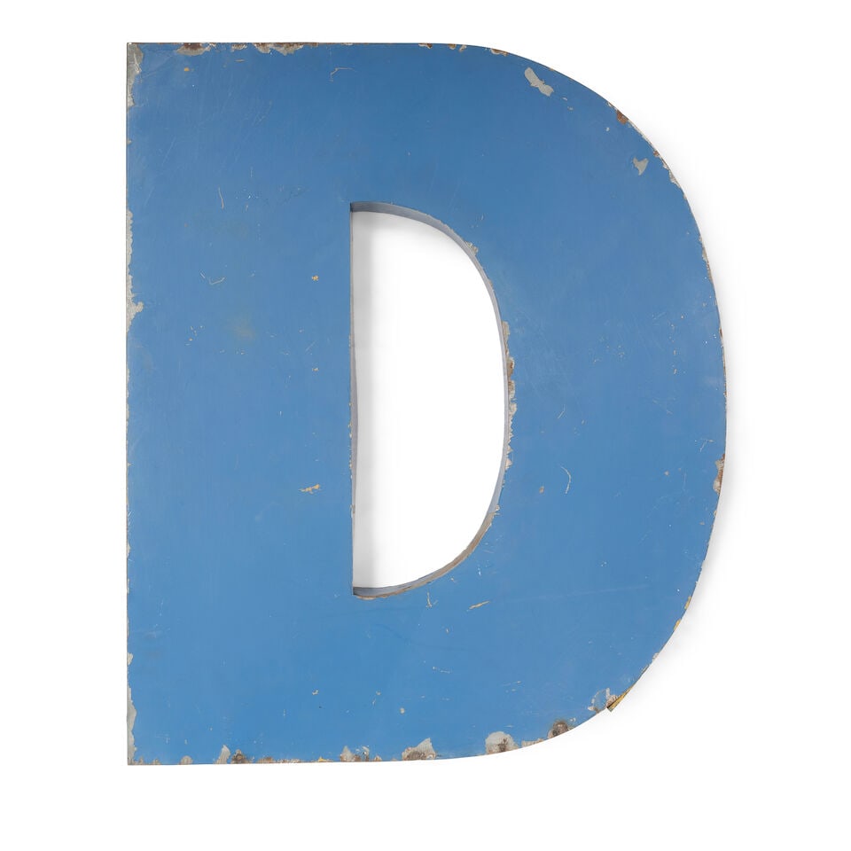 A BLUE PAINTED METAL LETTER D: A BLUE PAINTED METAL LETTER D height 36in; width 29 1/2in; depth 3in This lot is subject to the following lot symbols: ¤ ¤ Unless indicated by the ¤ symbol next to the lot number (or