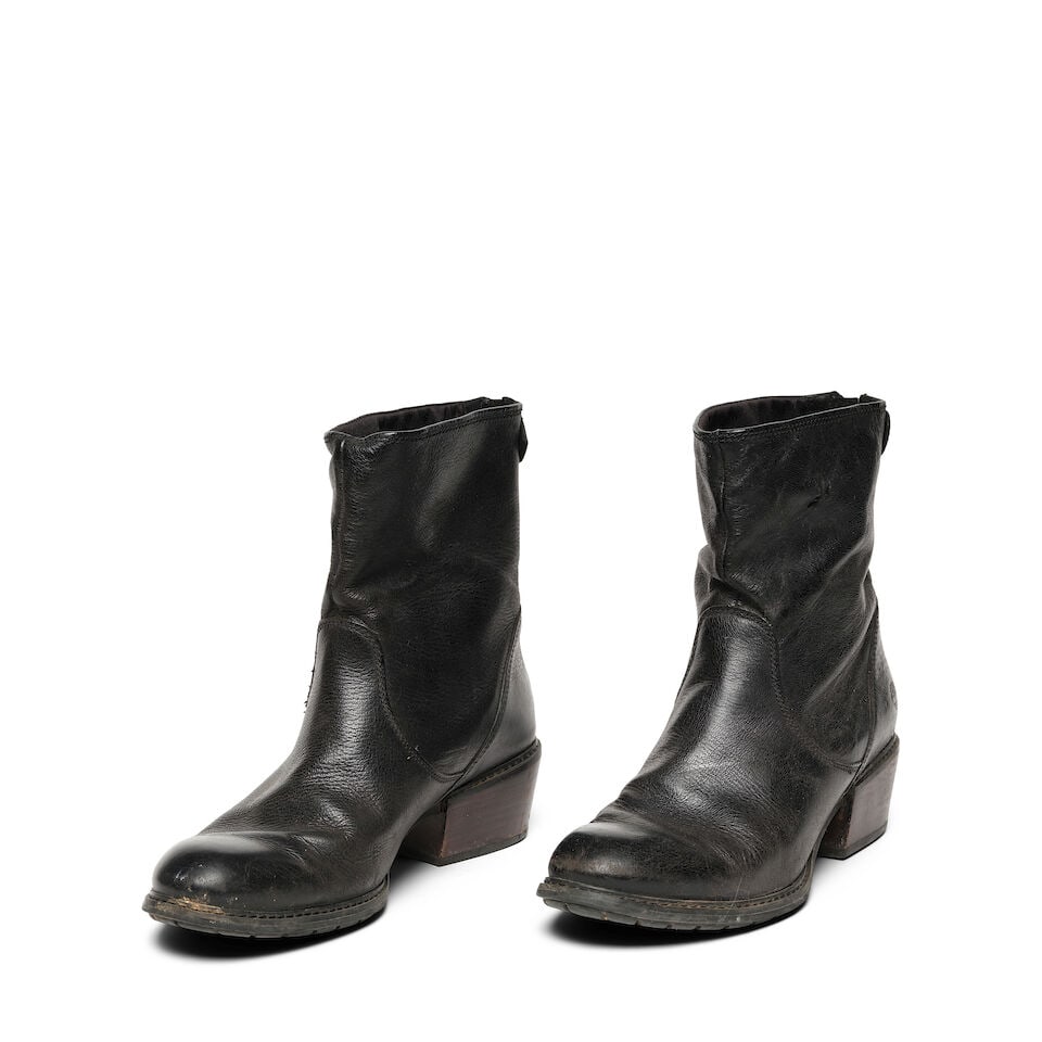 A PAIR OF TIMBERLAND BLACK LEATHER BOOTS: A PAIR OF TIMBERLAND BLACK LEATHER BOOTS Marked size 10. This lot is subject to the following lot symbols: ¤ ¤ Unless indicated by the ¤ symbol next to the lot number (or bearing an