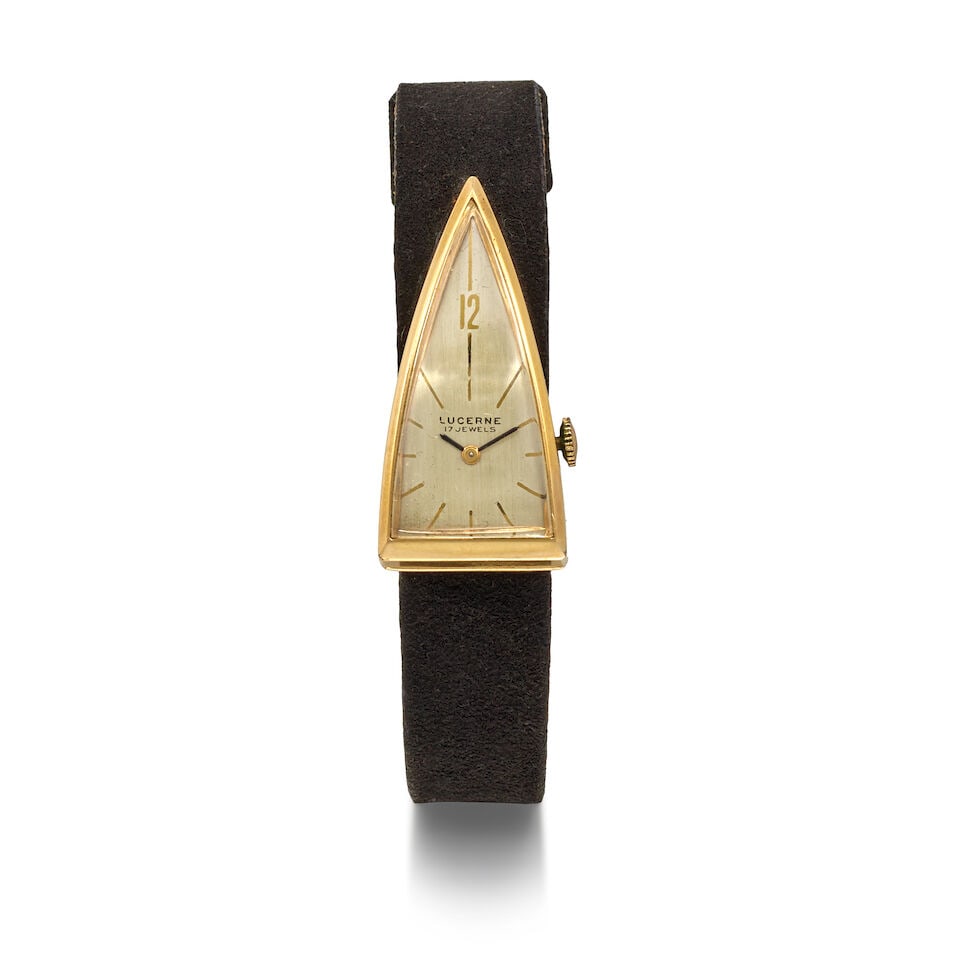 A LUCERNE 10K GOLD PLATED STAINLESS STEEL SPACE AGE TRIANGLE WRISTWATCH1950s: A LUCERNE 10K GOLD PLATED STAINLESS STEEL SPACE AGE TRIANGLE WRISTWATCH 1950s 17 jeweled, with CHAMPAGNE dial, gold-tone Arabic numerals, and black leather and suede wrist strap, signed dial, size